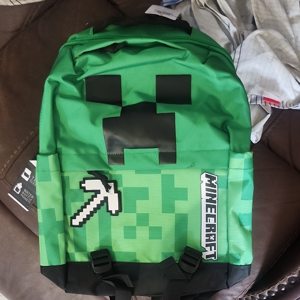 Waterproof Green and Black Pixelated Backpack with Iconic Game Design
